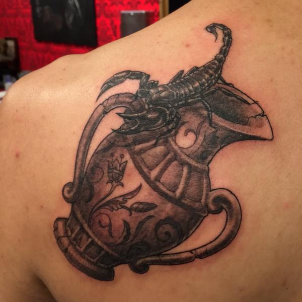 Aquarius and scorpion tattoo
