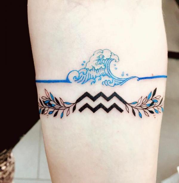 Aquarius and wave tattoo