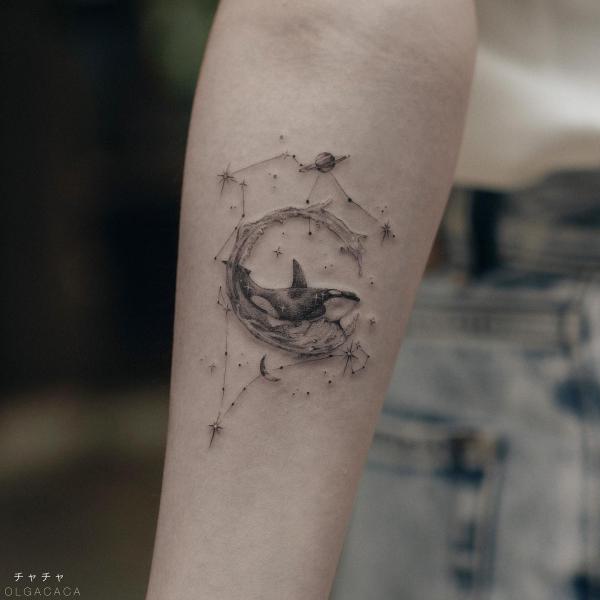 Aquarius constellation and Pisces whale tattoo