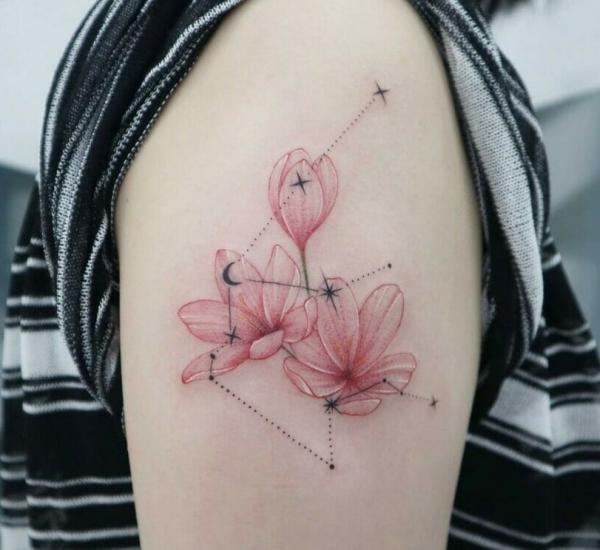 Aquarius constellation and tulip tattoo
