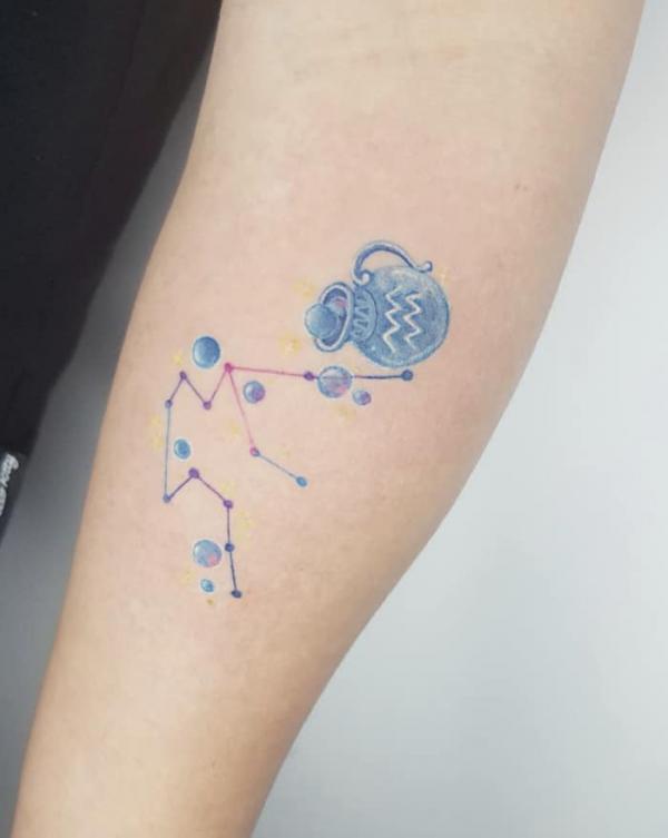 Aquarius constellation and water bearer tattoo
