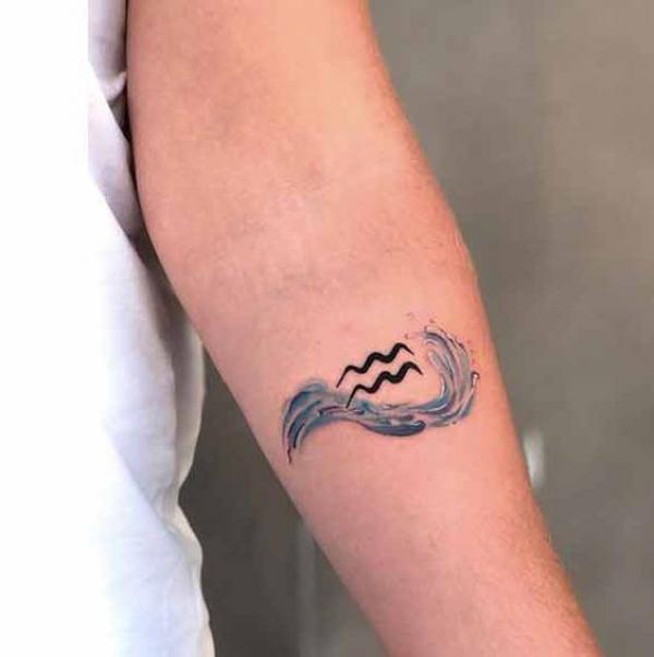 Aquarius glyph and wave tattoo