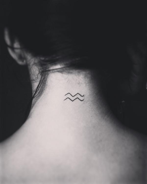Aquarius nape tattoo