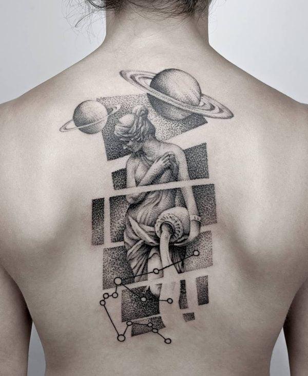 Aquarius ruling uranus saturn tattoo back