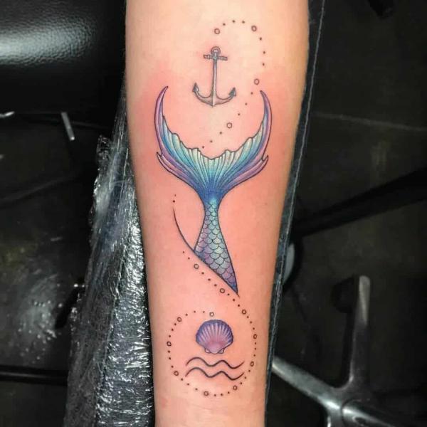 Aquarius shell and anchor mermaid tail tattoo