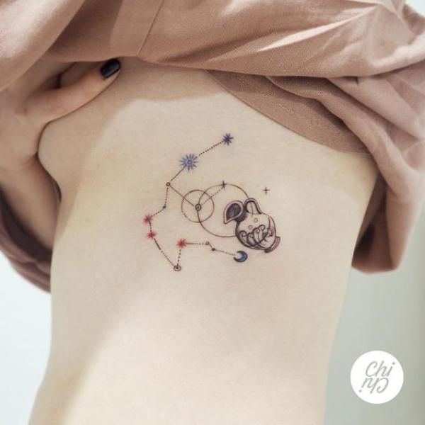 Aquarius side boob tattoo