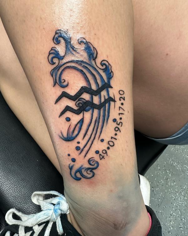 Aquarius tattoo leg