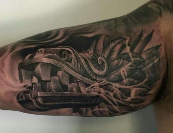 Bicep Quetzalcoatl tattoo