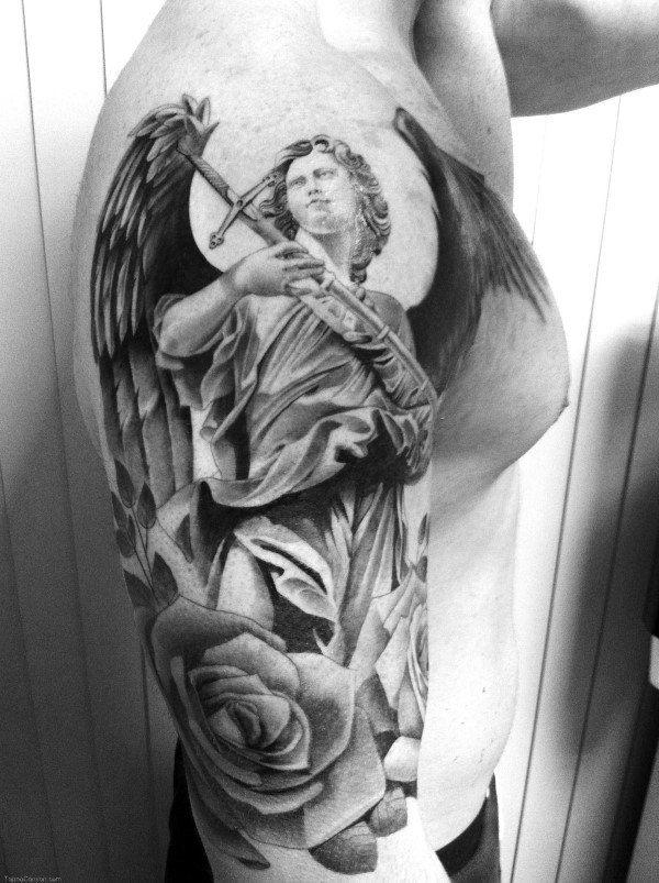 Black and grey Guardian angel with sword and rose tattoo