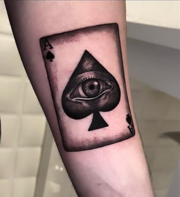Blackwork ace of spade with eye tattoo
