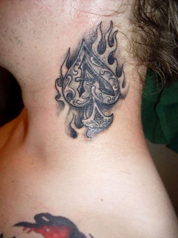 Burning ace of spade tattoo neck