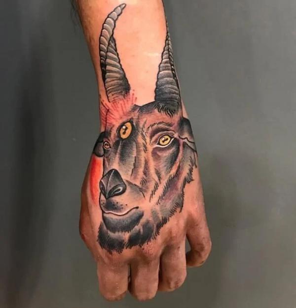 Capricorn Goat head hand tattoo