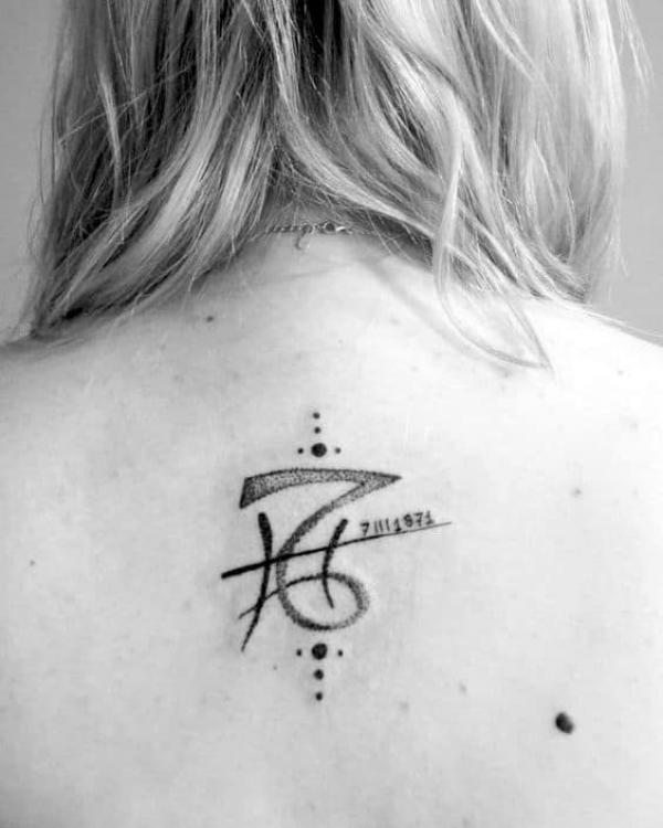 Capricorn and Pisces signs tattoo