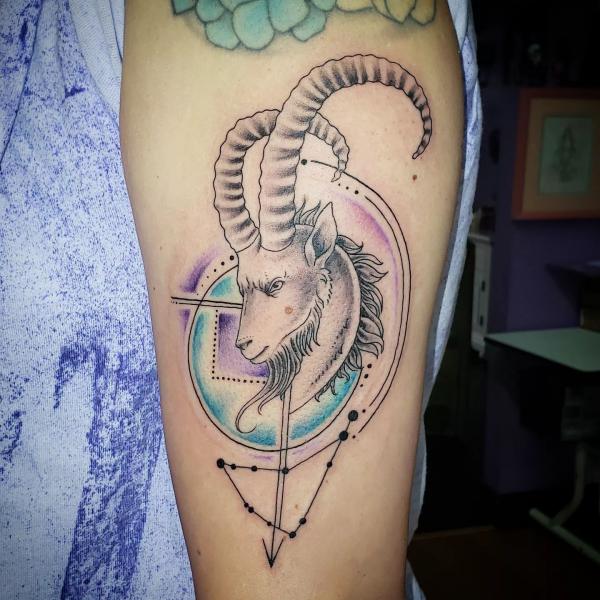 Capricorn goat and constellation tattoo half sleeve