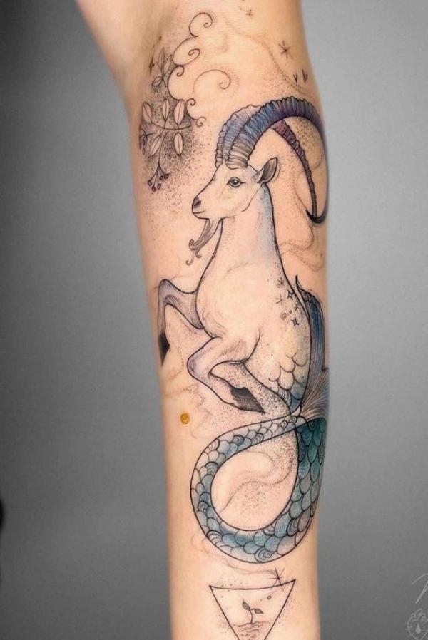Capricorn sea goat tattoo forearm