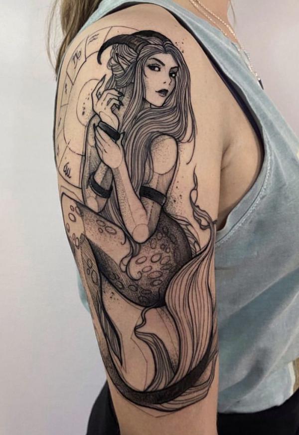 Capricorn sea goat woman and Zodiac wheel tattoo half sleeve