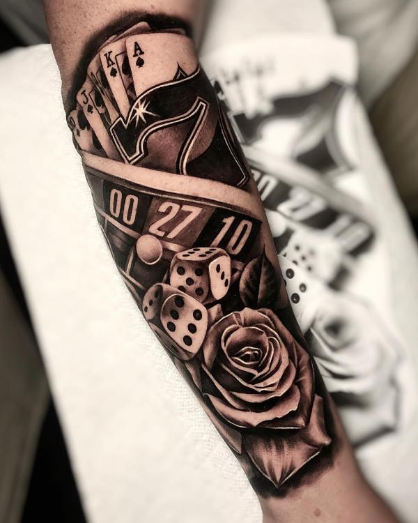 Cards money and dices tattoo