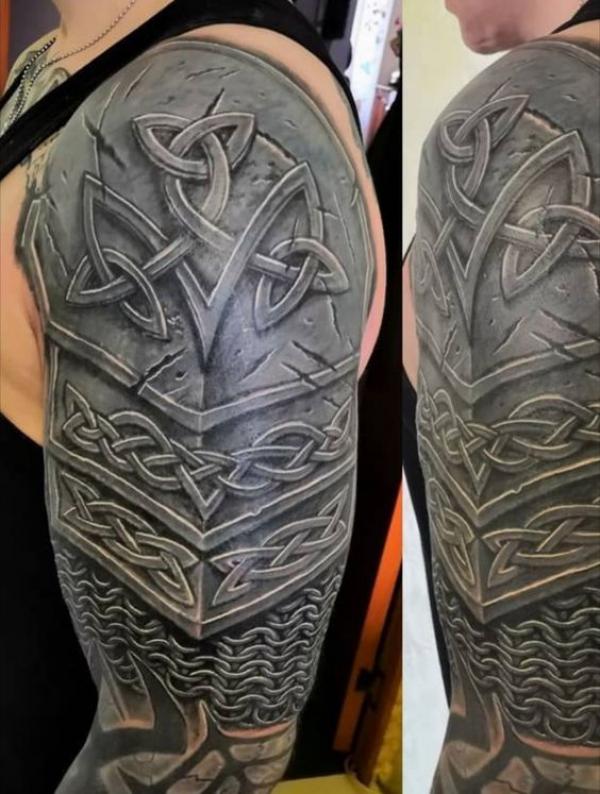 Celtic shield half sleeve tattoo
