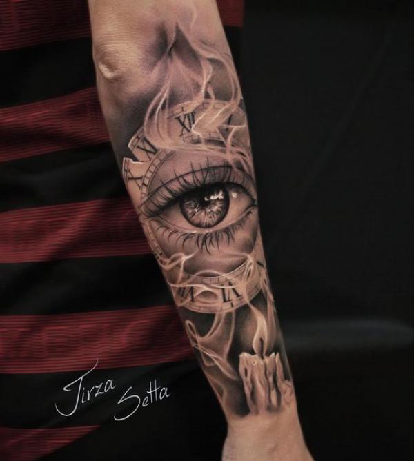 Clock with eye and candle with somke tattoo forearm