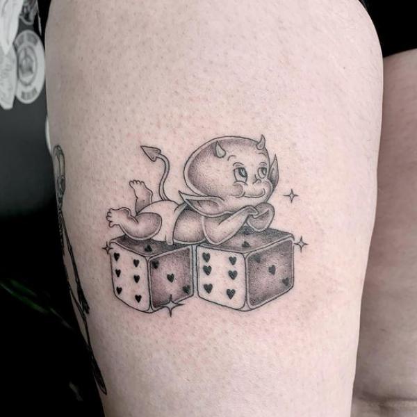 Dice and hot stuff tattoo