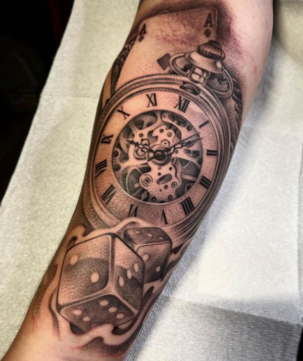 Dice and pocket watch tattoo