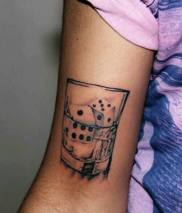Dice in glass tattoo