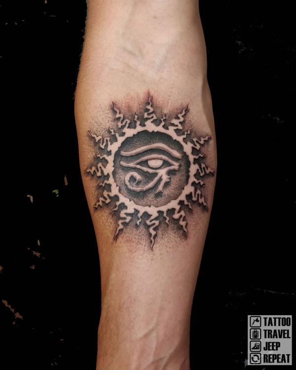 Eye of Ra sun stone tattoo