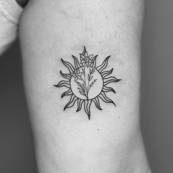 Flowers and sun line work tattoo