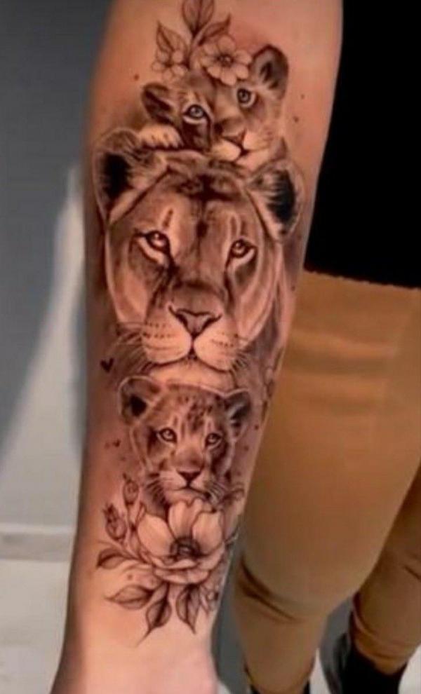Forarm lioness and two cubs tattoo