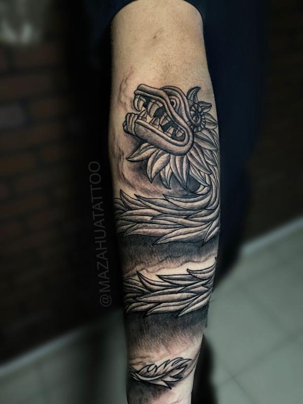 Forearm Quetzalcoatl tattoo