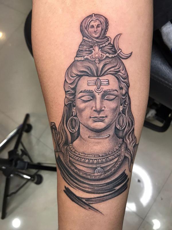 Forearm Shiva tattoo