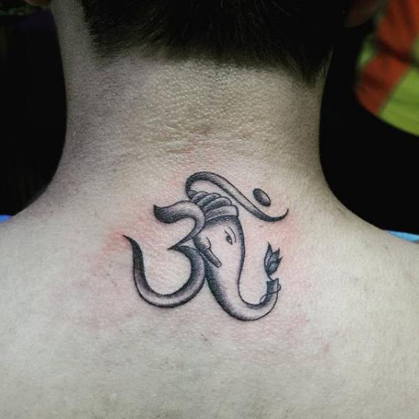 Ganesh OM neck tattoo