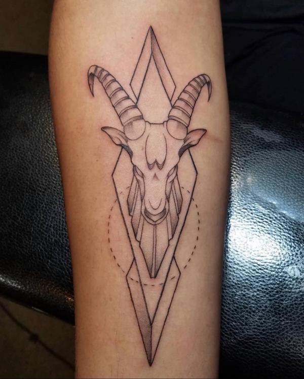 Geometric Capricorn goat head tattoo