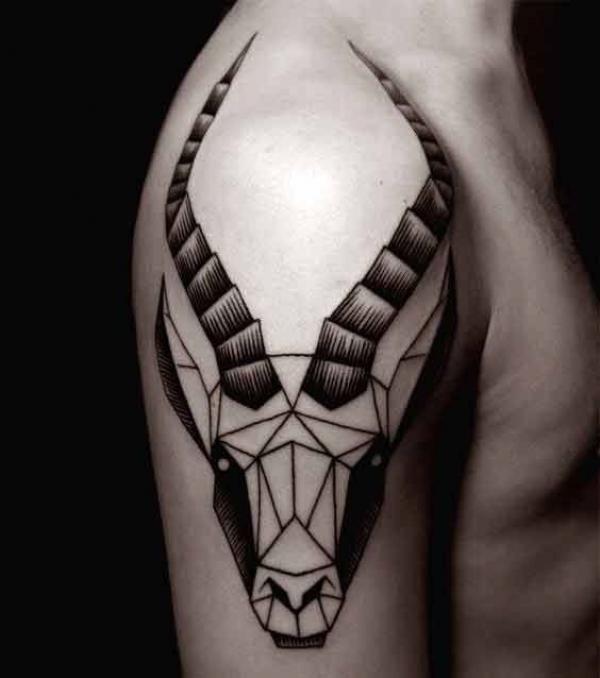 Geometric Capricorn goat with horn shoulder tattoo