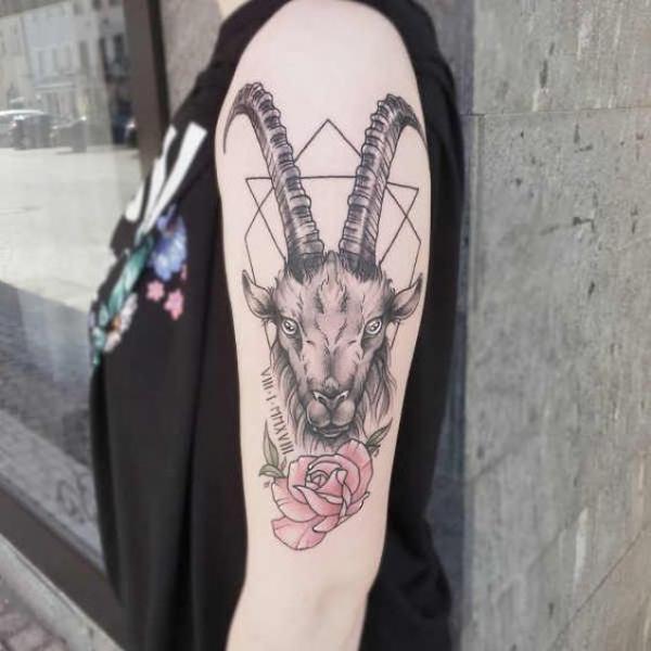 Geometric Capricorn with rose tattoo half sleeve