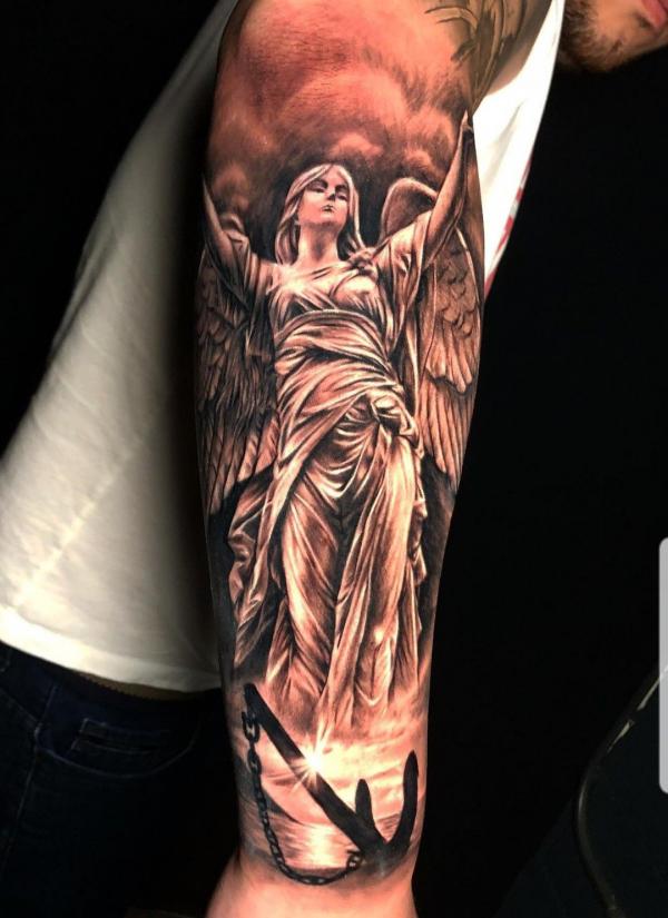 Guardian angel and anchor tattoo forearm