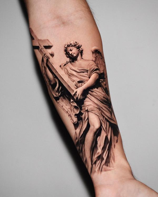 Guardian angel and cross tattoo