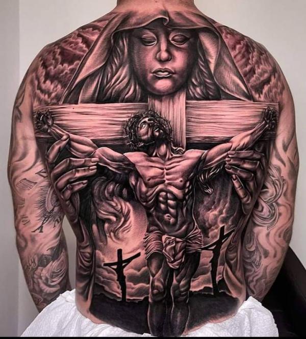 Guardian angel and cross with Jesus tattoo