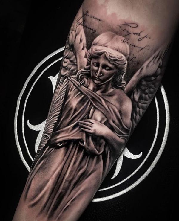 Guardian angel inner forearm tattoo