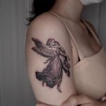 Guardian angel with a kid tattoo