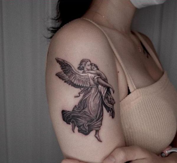 Guardian angel with a kid tattoo