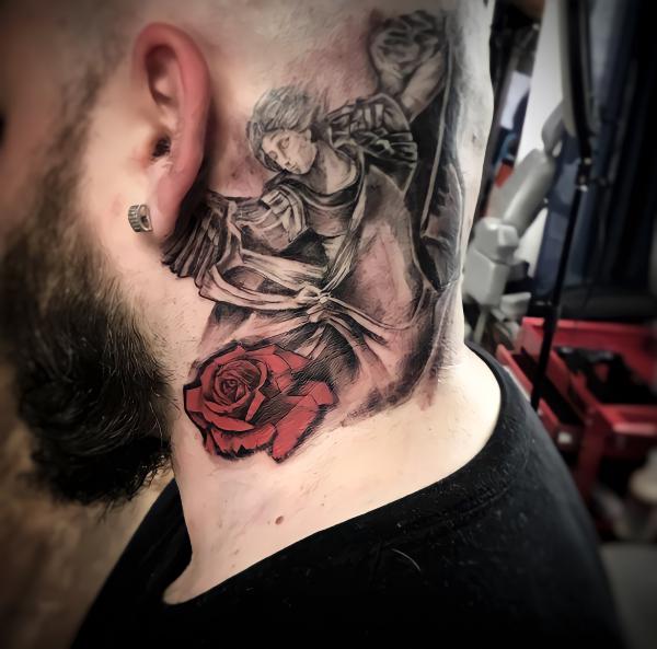 Guardian angel with red rose tattoo on neck