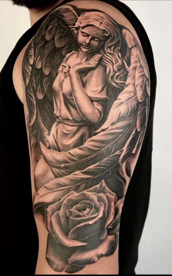 Guardian angel with rose tattoo half sleeve
