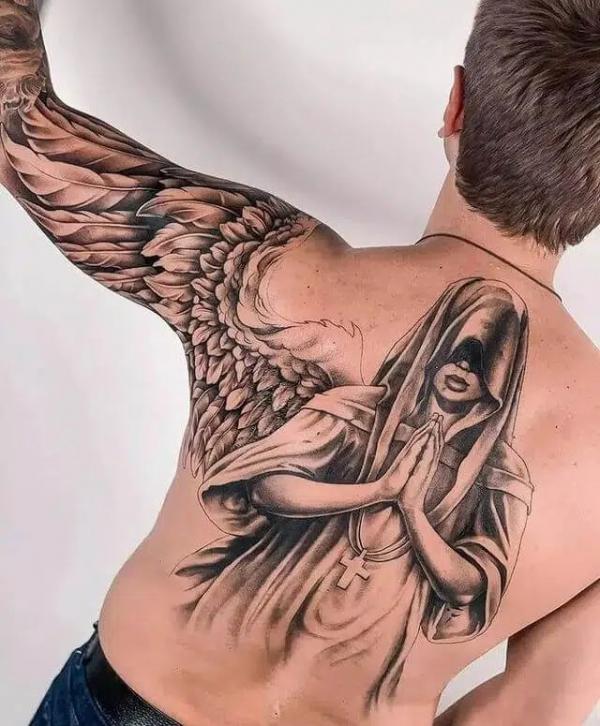 Guardian angle and wing tattoo