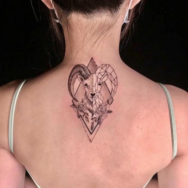 Half Capricorn goat half geometric with roses tattoo