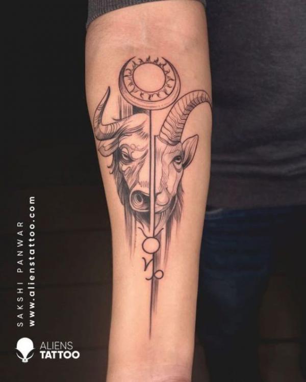 Half capricorn goat and half taurus bull tattoo