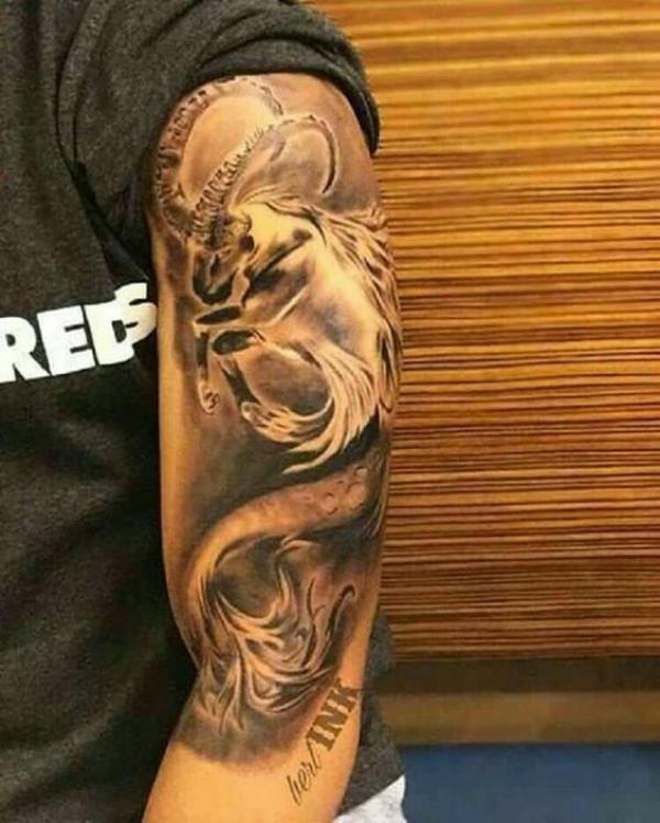 Half sleeve Capricorn sea goat tattoo realistic