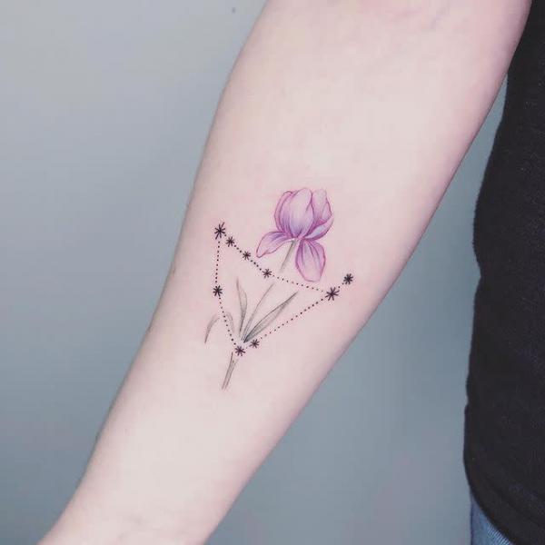 Iris flower and constellation tattoo