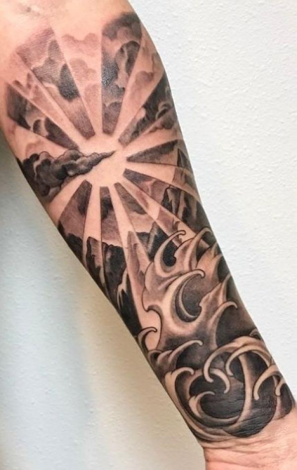 Japanese sun and wave tattoo black and grey