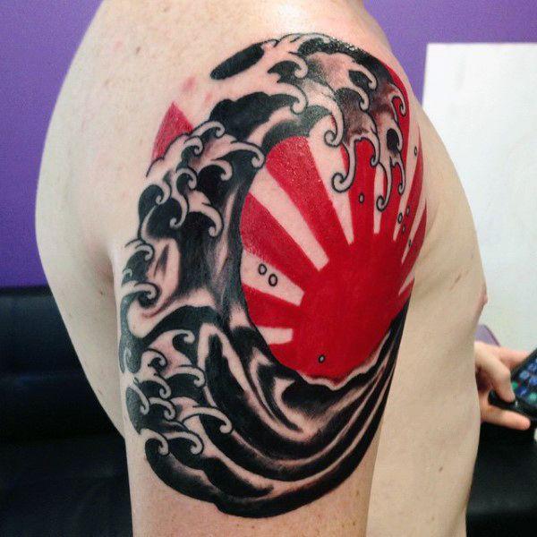 Japanese sun and wave tattoo shoulder